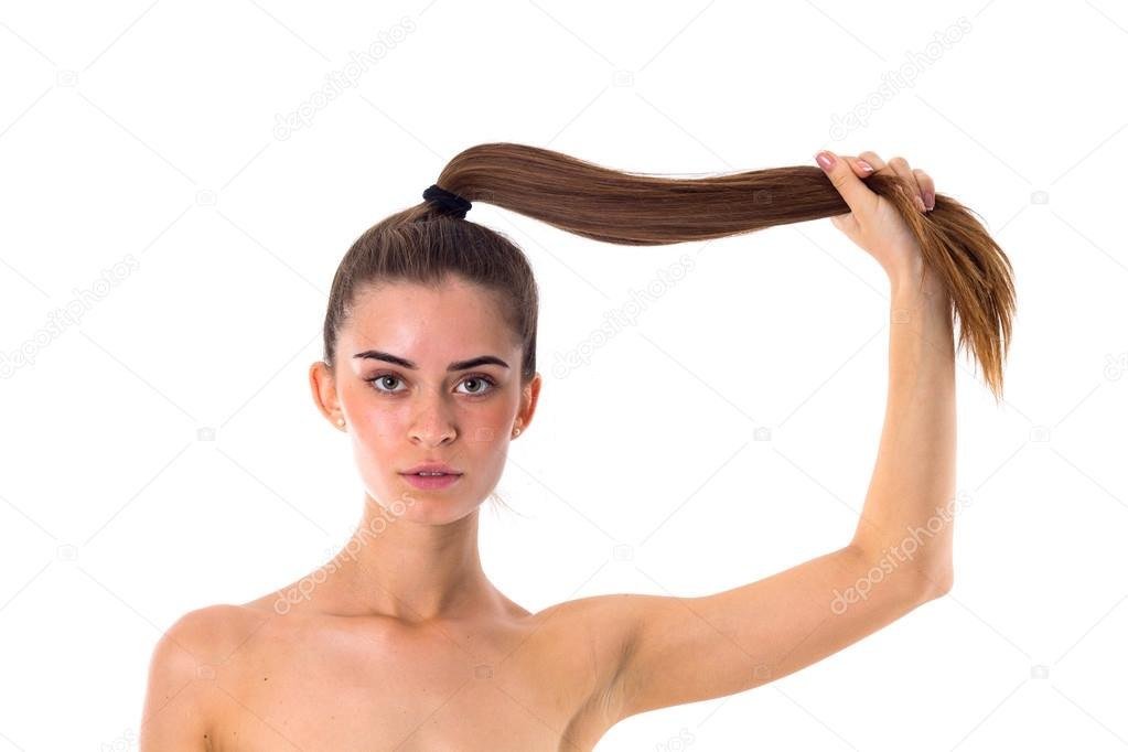 yankee doodle dandy - a woman pulling on her ponytail